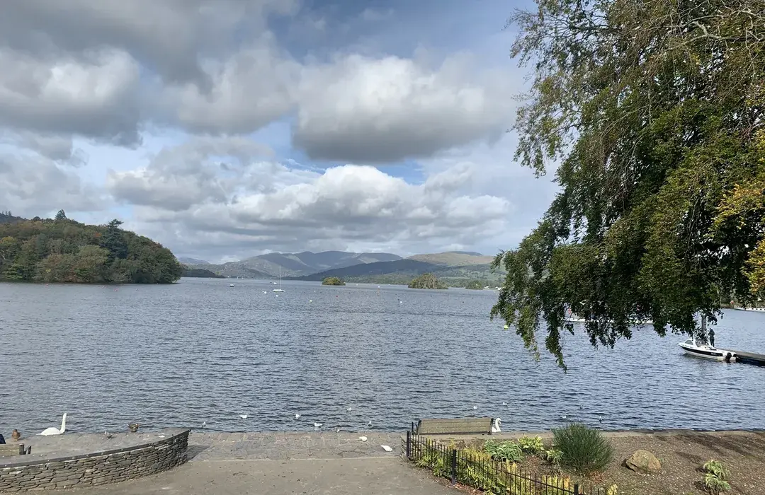 The flat lakeshore at Cockshott Point with views of Belle Isle, Bowness, Lake District