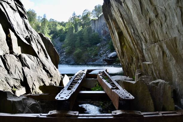 The Hodge Close Quarry arch and its reflection forming the famous skull illusion, Little Langdale, Lake District